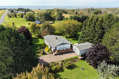The house from above, with the water on the horizon