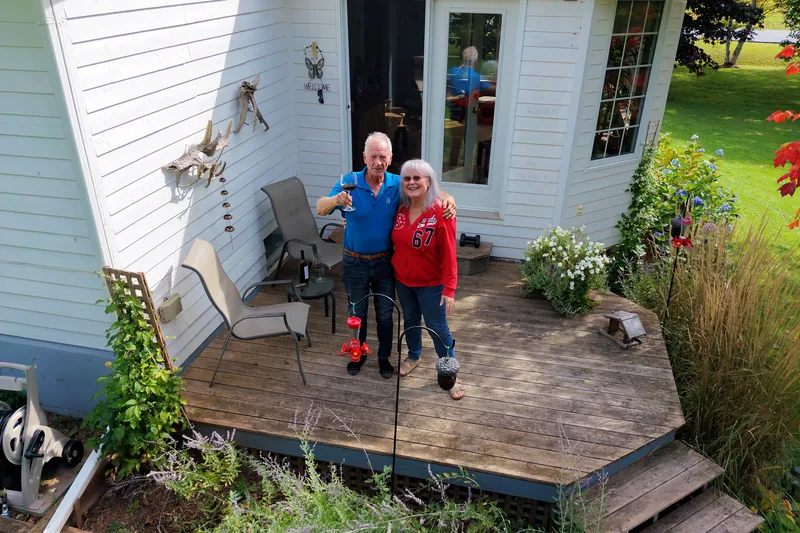 Brian and Beverly Cooper on their back deck